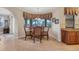 Bright breakfast nook with a bay window and seating for four at 2517 Rio Grande Dr, Punta Gorda, FL 33950