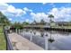 Private dock with seating area offering serene canal views at 2517 Rio Grande Dr, Punta Gorda, FL 33950