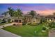 Stunning property showcasing a spacious house and beautiful landscaping at 2517 Rio Grande Dr, Punta Gorda, FL 33950