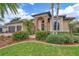 Inviting one-story home with stone accents and lush landscaping at 2517 Rio Grande Dr, Punta Gorda, FL 33950