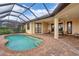 Inviting pool area with covered patio, ideal for outdoor entertaining at 2517 Rio Grande Dr, Punta Gorda, FL 33950