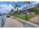 Concrete dock with seating and a fence providing privacy at 2517 Rio Grande Dr, Punta Gorda, FL 33950