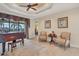 Spacious living room with two armchairs and access to a backyard view at 2517 Rio Grande Dr, Punta Gorda, FL 33950