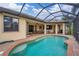 Enjoy this refreshing pool and spacious patio, perfect for relaxation at 2517 Rio Grande Dr, Punta Gorda, FL 33950