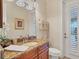 Powder room with granite vanity and exterior access at 2517 Rio Grande Dr, Punta Gorda, FL 33950