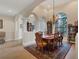 Formal dining room with a large table and access to the kitchen at 2517 Rio Grande Dr, Punta Gorda, FL 33950