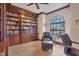 Spacious library with built-in wooden bookshelves and comfortable seating at 2517 Rio Grande Dr, Punta Gorda, FL 33950