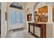 Elegant entry with double doors and a view into the formal dining room at 2517 Rio Grande Dr, Punta Gorda, FL 33950