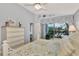 Bedroom with water view and white dresser at 3195 Village Ln, Port Charlotte, FL 33953