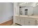 Double vanity bathroom with a large mirror at 3195 Village Ln, Port Charlotte, FL 33953