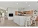 Modern kitchen with granite countertops and wooden cabinetry at 3195 Village Ln, Port Charlotte, FL 33953