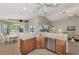 Eat-in kitchen with granite countertops and stainless steel appliances at 3195 Village Ln, Port Charlotte, FL 33953