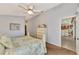 Bright bedroom with a comfortable bed and water view at 3195 Village Ln, Port Charlotte, FL 33953