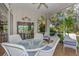 Enjoy relaxing views from this screened porch at 3195 Village Ln, Port Charlotte, FL 33953