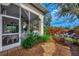 Enjoy the view from this patio, nestled beside a lake at 3195 Village Ln, Port Charlotte, FL 33953