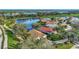 Aerial view of houses on a lakefront at 3195 Village Ln, Port Charlotte, FL 33953