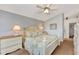 Main bedroom with light walls and a white wooden bed frame at 3195 Village Ln, Port Charlotte, FL 33953