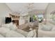 Open concept living room and kitchen with neutral decor at 3195 Village Ln, Port Charlotte, FL 33953