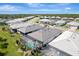 Aerial view of houses in a residential community at 1337 Sorrell Way, North Port, FL 34289