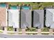 Aerial view showcasing a row of homes with private pools in a neat community setting at 1337 Sorrell Way, North Port, FL 34289