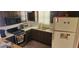 Galley kitchen with microwave, oven, and refrigerator at 1700 Morning Dove Ln, Englewood, FL 34224
