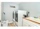 Laundry room with washer, dryer, and utility sink at 4632 Arlington Dr, Placida, FL 33946