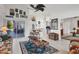 Gathering room with view into kitchen and other living areas at 13400 Buckett Cir, Port Charlotte, FL 33981