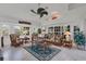 Relaxing Gathering room with wicker furniture and view of the pool at 13400 Buckett Cir, Port Charlotte, FL 33981