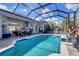 Relaxing pool and patio with covered lanai, ideal for outdoor living at 13400 Buckett Cir, Port Charlotte, FL 33981