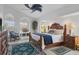 Spacious Primary bedroom with king-size bed and ensuite bathroom at 13400 Buckett Cir, Port Charlotte, FL 33981
