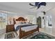 Bright Primary bedroom with king bed and access to bathroom at 13400 Buckett Cir, Port Charlotte, FL 33981