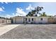 Charming single story home with a gravel driveway at 25 1St Ave, Englewood, FL 34223