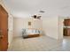 Bright and airy living room with tiled floors and a comfy couch at 25 1St Ave, Englewood, FL 34223
