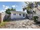 Small guest house with private patio and stone pathway at 25 1St Ave, Englewood, FL 34223