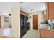Kitchen with wood cabinets, granite countertops and stainless steel appliances at 25 1St Ave, Englewood, FL 34223