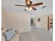 Open living space with tiled floors and access to the dining area at 25 1St Ave, Englewood, FL 34223