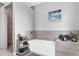 Relaxing bathroom featuring a soaking tub and modern tile at 235 Albatross Rd, Rotonda West, FL 33947