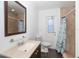 Bathroom with single vanity and shower at 20 Annapolis Ln, Rotonda West, FL 33947