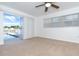 Bedroom with pool view and sliding glass doors at 20 Annapolis Ln, Rotonda West, FL 33947
