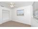 Simple bedroom with carpet, window, and built-in shelving at 20 Annapolis Ln, Rotonda West, FL 33947