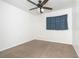 Simple bedroom with window and ceiling fan at 20 Annapolis Ln, Rotonda West, FL 33947