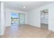 Dining area with tile floors and access to the pool at 20 Annapolis Ln, Rotonda West, FL 33947