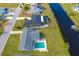 Aerial view showing home, pool, and canal-front location at 20 Annapolis Ln, Rotonda West, FL 33947