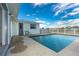 Clean, rectangular pool with a concrete deck, perfect for summer fun at 20 Annapolis Ln, Rotonda West, FL 33947