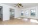 Bright living room featuring tile floors and ceiling fan at 20 Annapolis Ln, Rotonda West, FL 33947