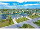 Aerial view of home, neighborhood, and canal at 20 Annapolis Ln, Rotonda West, FL 33947