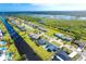 Aerial view of home, neighborhood and waterway at 20 Annapolis Ln, Rotonda West, FL 33947