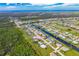 Wide aerial showcasing home, waterway, and ocean at 20 Annapolis Ln, Rotonda West, FL 33947