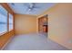 Sunroom with tile floors and access to kitchen at 612 Deerwood Ave # 169, Englewood, FL 34223