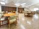 Community game room with multiple tables and chairs at 612 Deerwood Ave # 169, Englewood, FL 34223